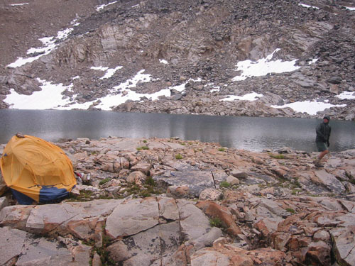 Dave escapes tent fly shelter and hurries toward VE-25 platform construction site