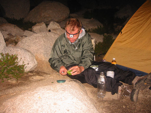 Dave constructs homemade marguaritas by head lamp