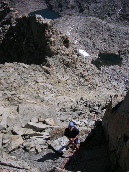Climbing up the NE Ridge of Mt. Mendel with camp below
