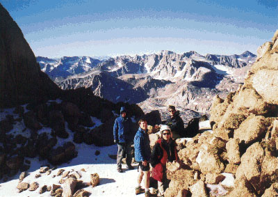 Puppy, Randu, Jim, and Ken at the notch N of Humphreys