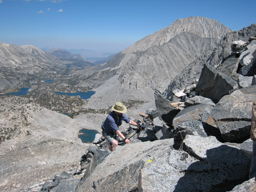 Grant Glouser climbs Pyramid Peak