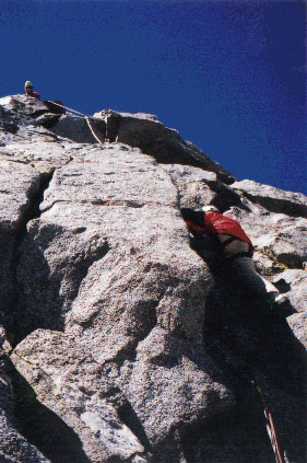 Doug belays Foo'ball up the Swiss Arête